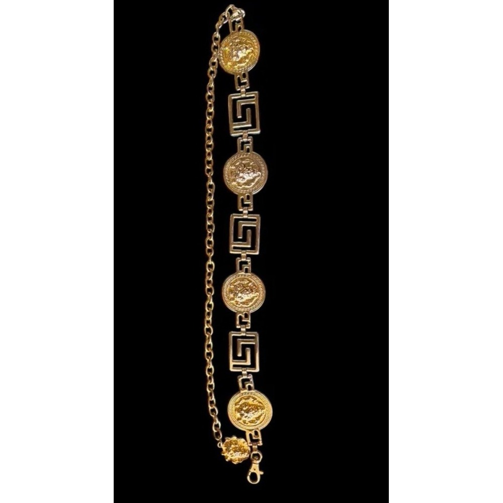 THE LIMITED VINTAGE GOLD TONE BELT WITH LION HEAD BUCKLE 40" ADJUSTABLE SIGNED
